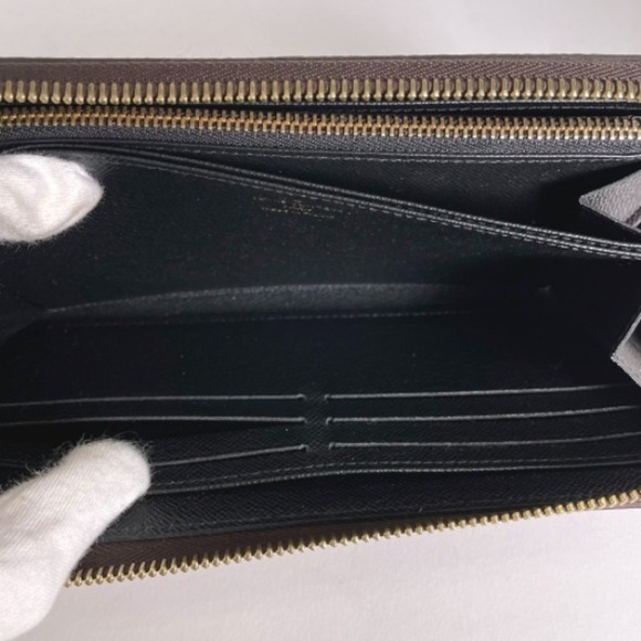 LOUIS VUITTON Brown Monogram Wallet - Picture 8 of 12